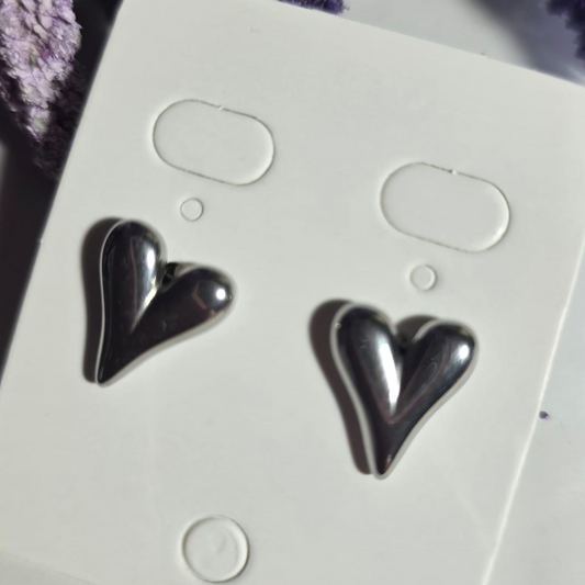 Aretes de acero inoxidable dorados en forma de corazón moderno